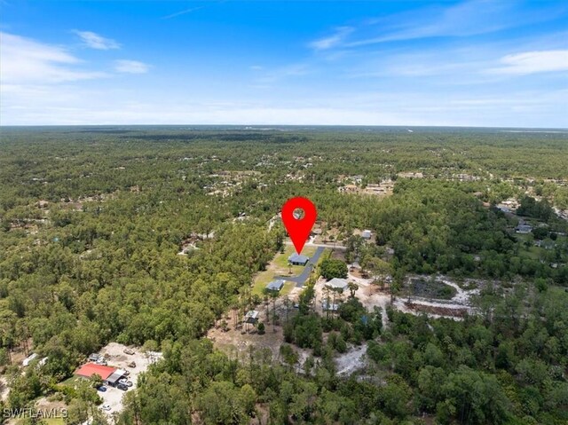 2948 2nd Ave NE, Naples, FL 34120 - aerial view of property and surrounding area with a forest