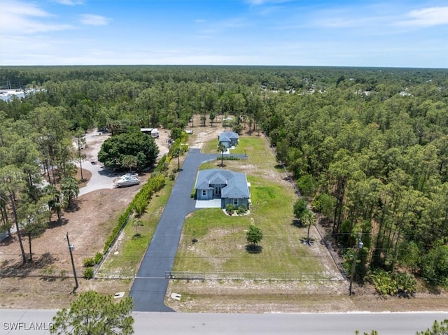 2948 2nd Ave NE, Naples, FL 34120 - aerial view of a heavily wooded area