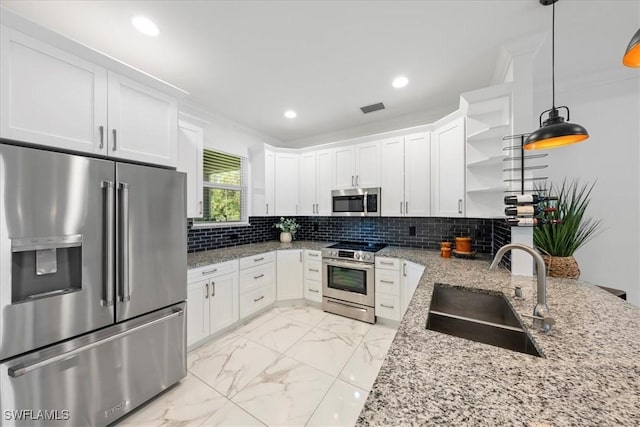 2948 2nd Ave NE, Naples, FL 34120 - kitchen featuring appliances with stainless steel finishes, a sink, open shelves, white cabinets, and light marble finish floors