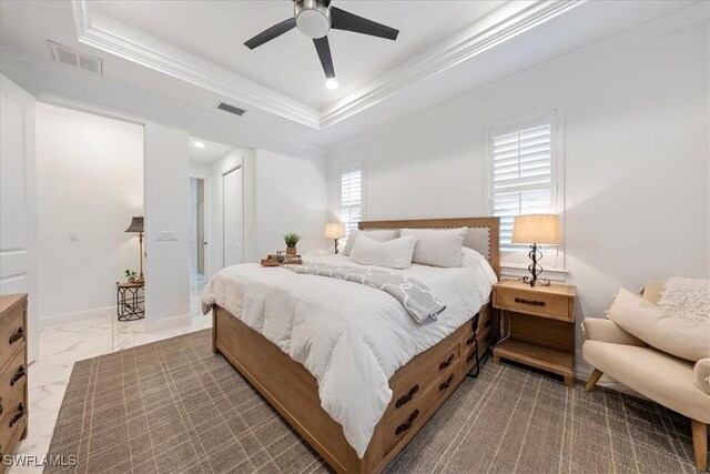 2948 2nd Ave NE, Naples, FL 34120 - bedroom featuring crown molding, a raised ceiling, a closet, and ceiling fan