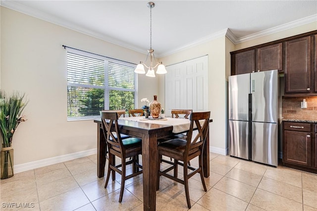 11221 Yellow Poplar Dr, Fort Myers, FL 33913 - dining area with a notable chandelier, baseboards, ornamental molding, and light tile patterned floors