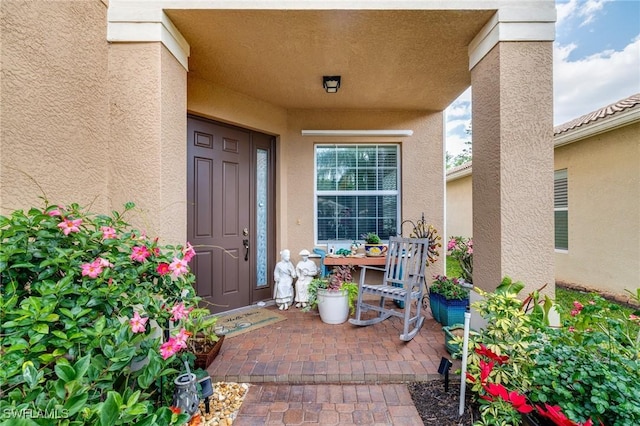 11221 Yellow Poplar Dr, Fort Myers, FL 33913 - entrance to property featuring stucco siding