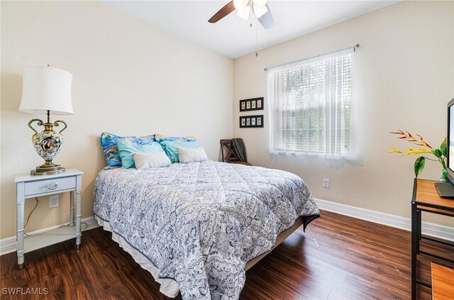 11221 Yellow Poplar Dr, Fort Myers, FL 33913 - bedroom with a ceiling fan, baseboards, and dark wood-type flooring