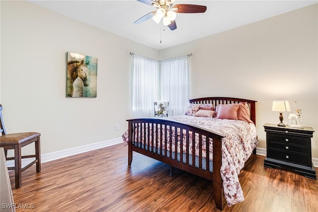 11221 Yellow Poplar Dr, Fort Myers, FL 33913 - bedroom with ceiling fan, baseboards, and wood finished floors