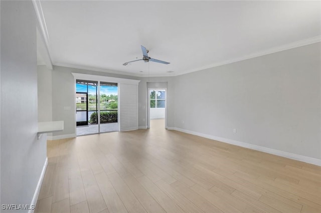 18911 Bay Woods Lake Dr Unit 102, Fort Myers, FL 33908 - unfurnished room featuring ornamental molding, a ceiling fan, baseboards, and light wood-style flooring