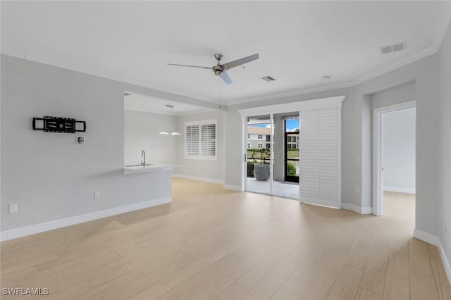 18911 Bay Woods Lake Dr Unit 102, Fort Myers, FL 33908 - empty room featuring a ceiling fan, ornamental molding, baseboards, and light wood finished floors
