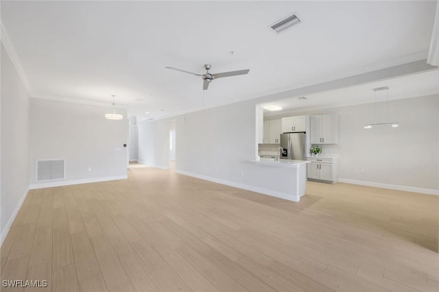 18911 Bay Woods Lake Dr Unit 102, Fort Myers, FL 33908 - unfurnished living room featuring baseboards, light wood-style flooring, a ceiling fan, crown molding, and a sink