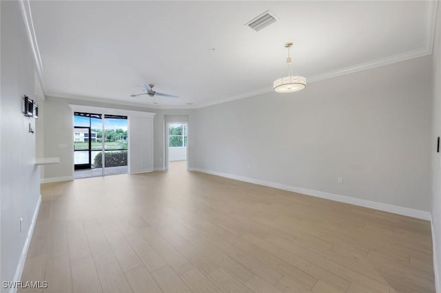 18911 Bay Woods Lake Dr Unit 102, Fort Myers, FL 33908 - unfurnished living room with crown molding, baseboards, ceiling fan, and light wood finished floors