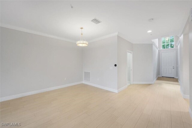 18911 Bay Woods Lake Dr Unit 102, Fort Myers, FL 33908 - spare room with light wood finished floors, crown molding, baseboards, and recessed lighting
