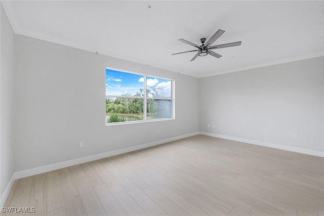 18911 Bay Woods Lake Dr Unit 102, Fort Myers, FL 33908 - unfurnished room with ceiling fan, baseboards, light wood-style floors, and ornamental molding