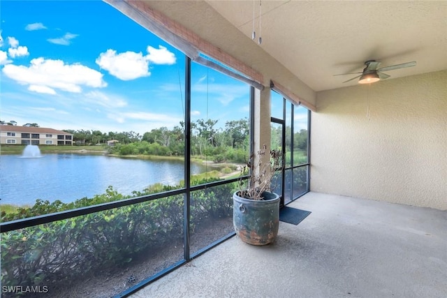 18911 Bay Woods Lake Dr Unit 102, Fort Myers, FL 33908 - sunroom / solarium with a water view and a textured wall