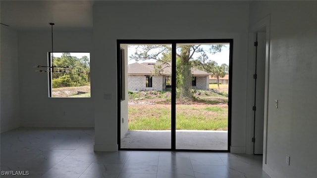3501 70th St W, Lehigh Acres, FL 33971 - doorway to outside featuring plenty of natural light