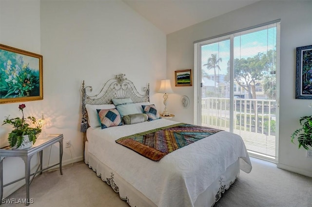 281 Lenell Rd Unit 1 7-A, Fort Myers Beach, FL 33931 - bedroom featuring baseboards, access to outside, light colored carpet, and vaulted ceiling