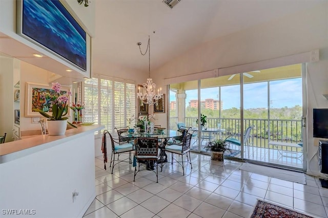 281 Lenell Rd Unit 1 7-A, Fort Myers Beach, FL 33931 - dining area featuring light tile patterned flooring, vaulted ceiling, and a chandelier
