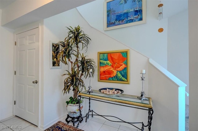 281 Lenell Rd Unit 1 7-A, Fort Myers Beach, FL 33931 - hallway featuring tile patterned floors and baseboards