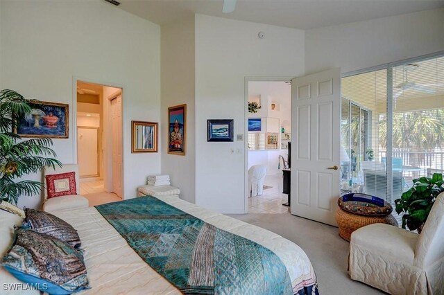 281 Lenell Rd Unit 1 7-A, Fort Myers Beach, FL 33931 - bedroom featuring connected bathroom, high vaulted ceiling, and light carpet