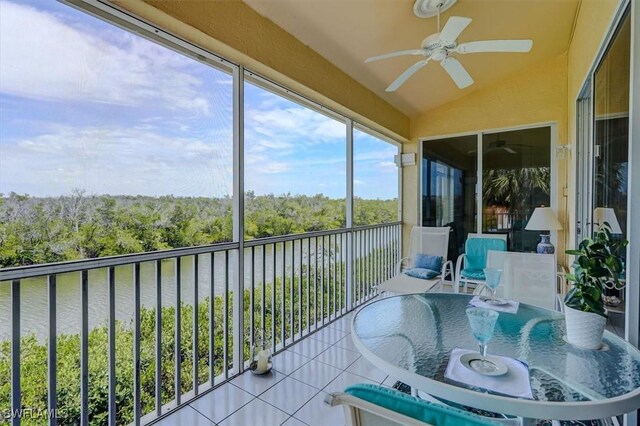 281 Lenell Rd Unit 1 7-A, Fort Myers Beach, FL 33931 - sunroom / solarium featuring a ceiling fan, a water view, and outdoor dining area
