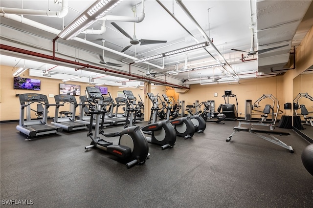 workout area featuring ceiling fan