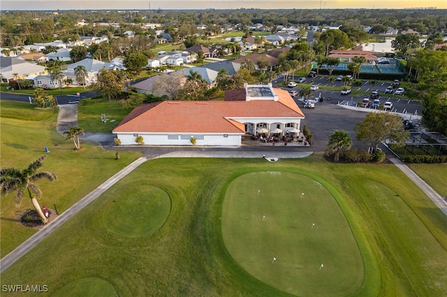 bird's eye view with a residential view and view of golf course