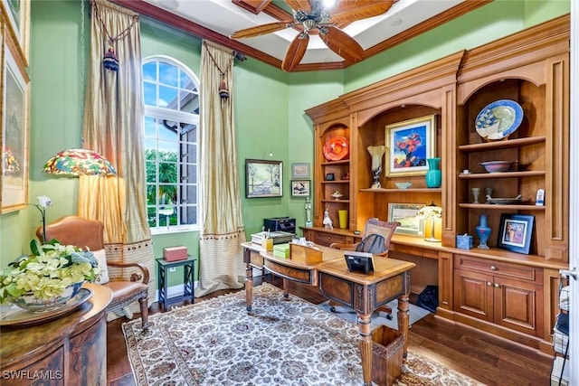 8993 Crooked Stick Ct, Naples, FL 34113 - office area featuring crown molding, baseboards, ceiling fan, dark wood-type flooring, and built in shelves