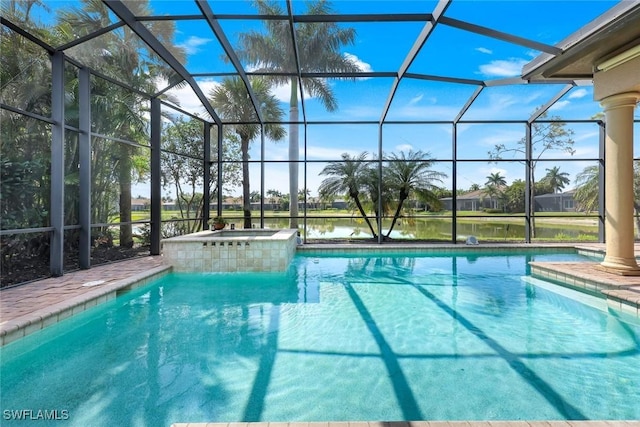 8993 Crooked Stick Ct, Naples, FL 34113 - outdoor pool with glass enclosure and an in ground hot tub
