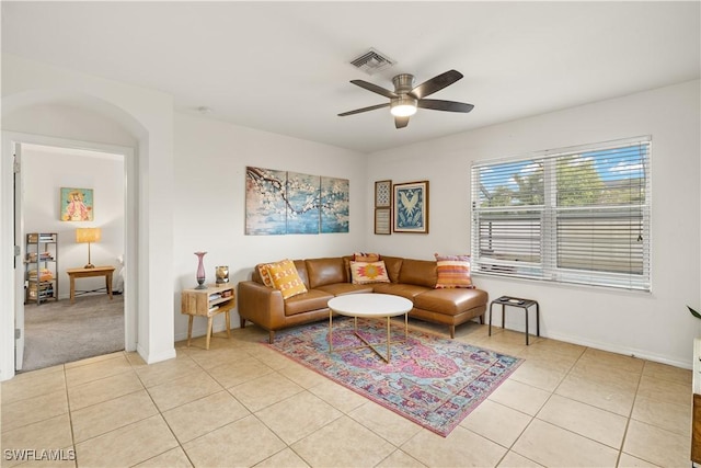 618 SW 18th St, Cape Coral, FL 33991 - living area with light tile patterned floors, ceiling fan, baseboards, and visible vents