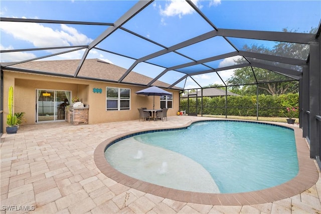 618 SW 18th St, Cape Coral, FL 33991 - pool featuring glass enclosure, exterior kitchen, and a patio area