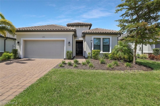 11912 Noveli Ct, Fort Myers, FL 33913 - mediterranean / spanish house featuring a front lawn, a tiled roof, driveway, an attached garage, and stucco siding