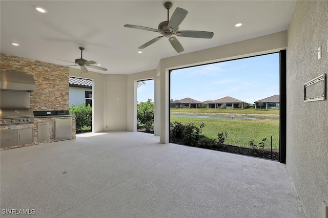 11912 Noveli Ct, Fort Myers, FL 33913 - exterior space featuring grilling area, exterior kitchen, ceiling fan, and a water view