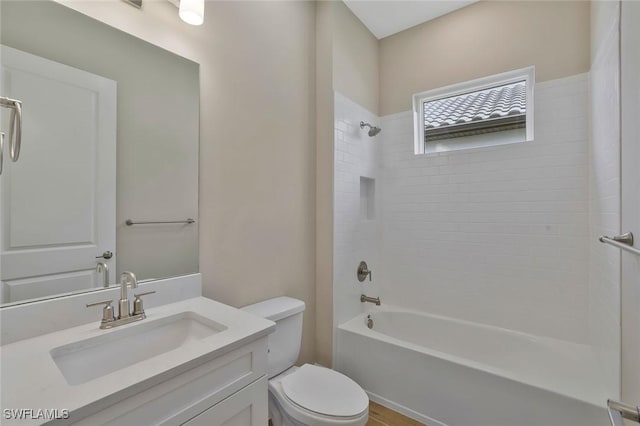 11912 Noveli Ct, Fort Myers, FL 33913 - bathroom featuring toilet, vanity, and  shower combination