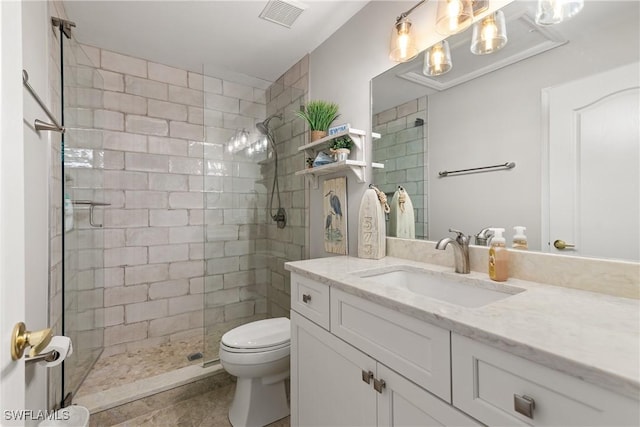 full bath featuring vanity, toilet, tile patterned flooring, visible vents, and tiled shower