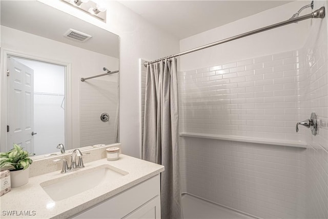 2810 29th St SW, Lehigh Acres, FL 33976 - bathroom featuring vanity and curtained shower