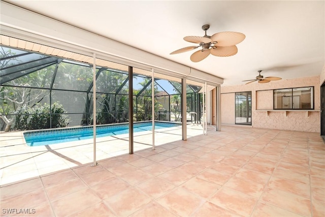 outdoor pool featuring ceiling fan