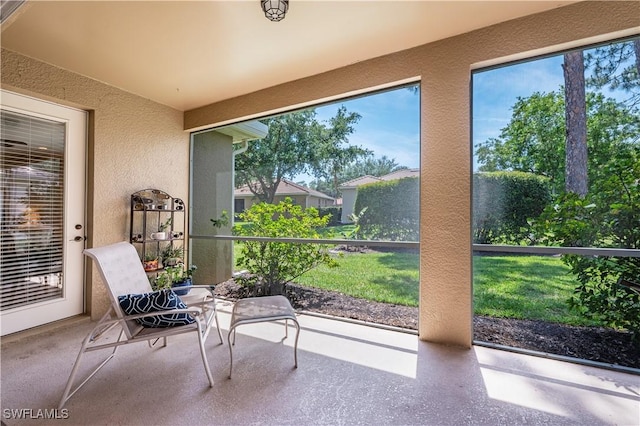 sunroom featuring a wealth of natural light