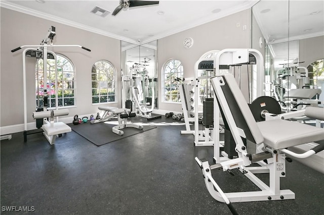 gym with crown molding, a ceiling fan, baseboards, and visible vents