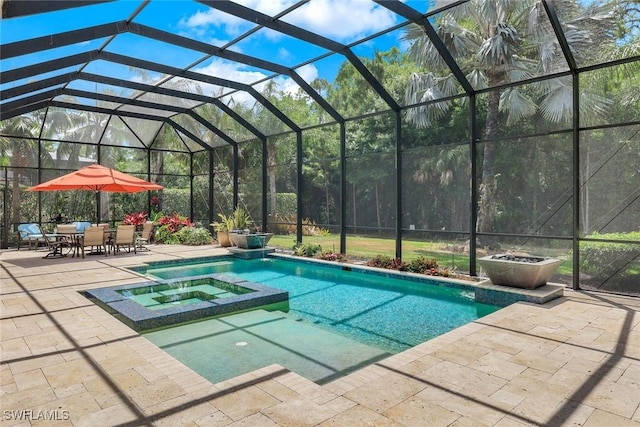view of pool featuring outdoor dining space, a patio area, glass enclosure, and a pool with connected hot tub