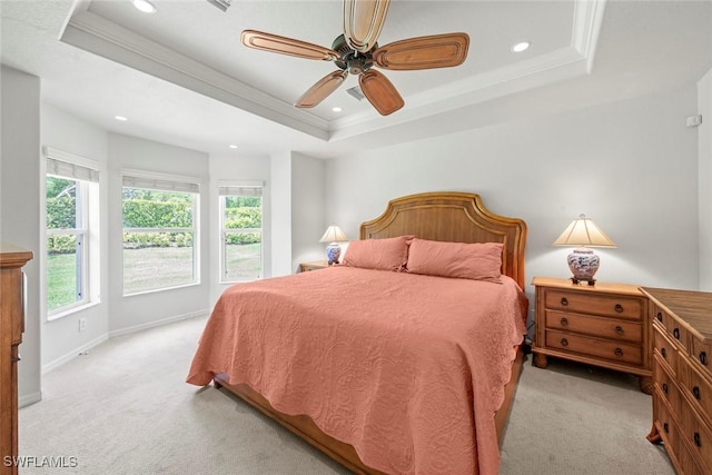 9046 Astonia Way, Estero, FL 33967 - bedroom with recessed lighting, a raised ceiling, crown molding, and light colored carpet