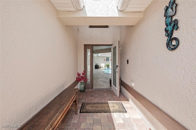 9046 Astonia Way, Estero, FL 33967 - property entrance featuring stucco siding