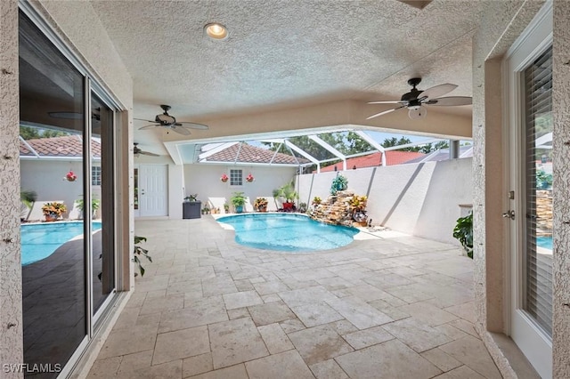 9046 Astonia Way, Estero, FL 33967 - outdoor pool featuring a patio area, a lanai, and a ceiling fan