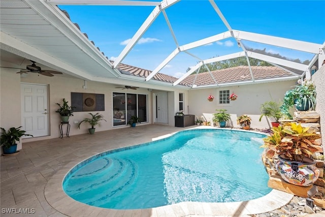 9046 Astonia Way, Estero, FL 33967 - pool featuring glass enclosure, a patio, and ceiling fan