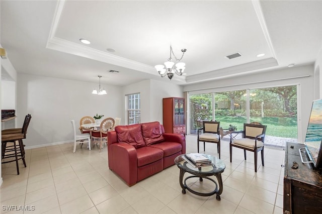 9046 Astonia Way, Estero, FL 33967 - living room with visible vents, a chandelier, and a raised ceiling