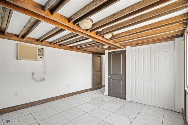 finished basement featuring marble finish floor