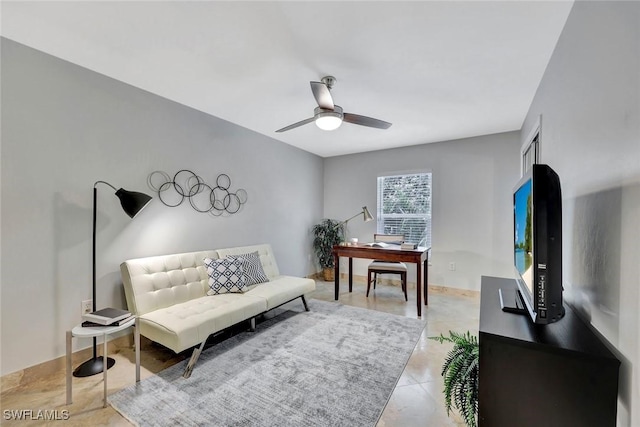 11499 Forest Mere Dr, Bonita Springs, FL 34135 - sitting room featuring a ceiling fan and light tile patterned floors
