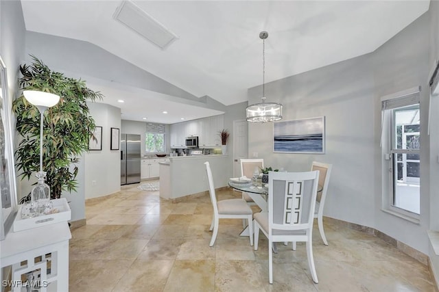 11499 Forest Mere Dr, Bonita Springs, FL 34135 - dining space with a chandelier, lofted ceiling, and visible vents