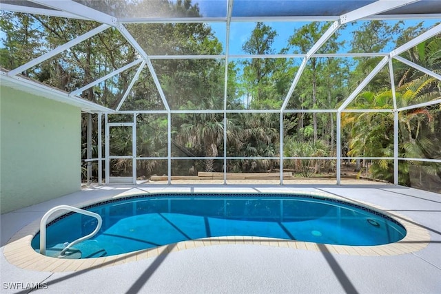 11499 Forest Mere Dr, Bonita Springs, FL 34135 - outdoor pool with a lanai and a patio
