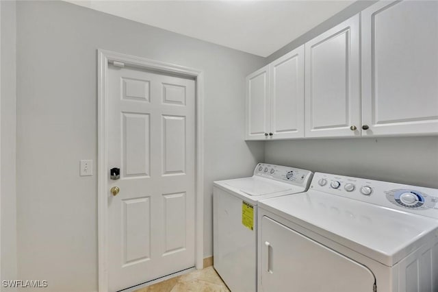 11499 Forest Mere Dr, Bonita Springs, FL 34135 - washroom with cabinet space and independent washer and dryer