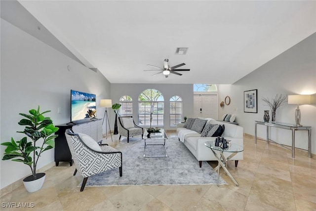 11499 Forest Mere Dr, Bonita Springs, FL 34135 - living area with vaulted ceiling, visible vents, a ceiling fan, and baseboards