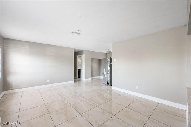 2605 Jackson St, Fort Myers, FL 33901 - spare room featuring visible vents, baseboards, and light tile patterned flooring