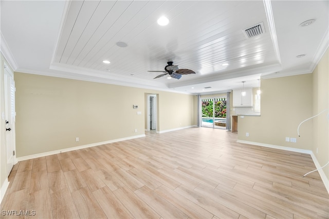 1135 7th St S, Naples, FL 34102 - unfurnished living room with a tray ceiling, ceiling fan, light wood-style floors, ornamental molding, and recessed lighting