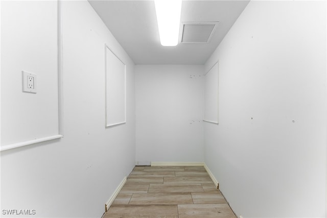 1135 7th St S, Naples, FL 34102 - spacious closet with light wood-style floors